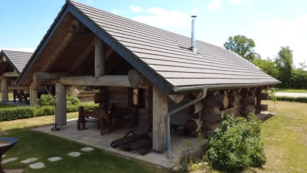 Immobilie in Groß Nemerow - Etablierte Ferienanlage am Tollensesee - Natur, Ruhe und Rendite in der Mecklenburgischen Seenplatte - 8 Stück Exklusive Naturstammhäusern in naturnah - Bild 1