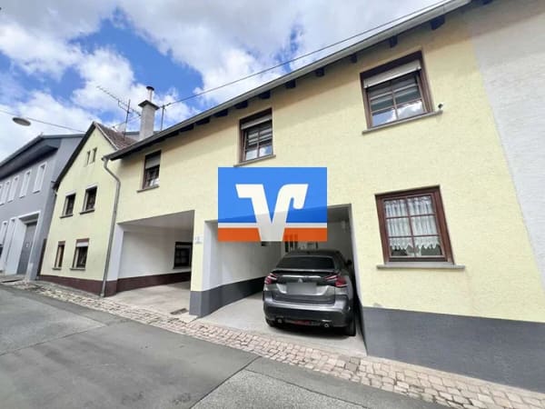 Immobilie in Waldlaubersheim - TOP gepflegtes Zweifamilienhaus mit besonderer Dachterrasse - Bild 0