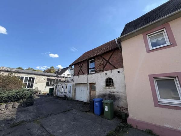 Immobilie in Pfungstadt - Wohnhaus mit Lagerhalle im Herzen von Pfungstadt - Bild 1