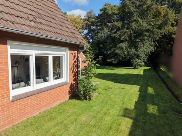 Immobilie in Westoverledingen - Gepflegtes, renoviertes Wohnhaus in ruhiger Lage mit Kaminofen, schönem Grundstück und Garage - Bild 3