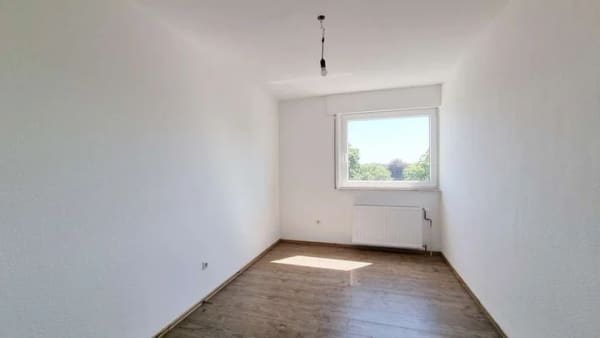 Immobilie in Gütersloh - Modernisierte Maisonette mit Süd-Balkon und Weitblick in beliebter Lage von Spexard! - Bild 4