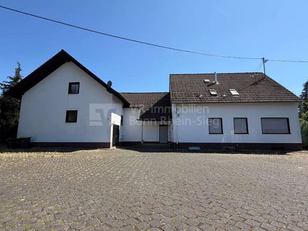 Immobilie in Ruppichteroth - Mehrfamilienhaus mit 5 WE und 8 Stellplätzen in dörflicher Lage von Ruppichteroth - Bild 0