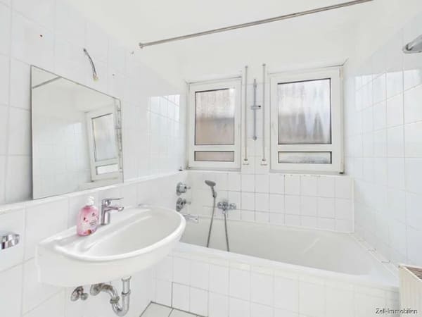 Immobilie in Oestrich-Winkel - Gepflegte 3-Zimmer-Eigentumswohnung mit Südterrasse und TG-Stellplatz - Bild 2