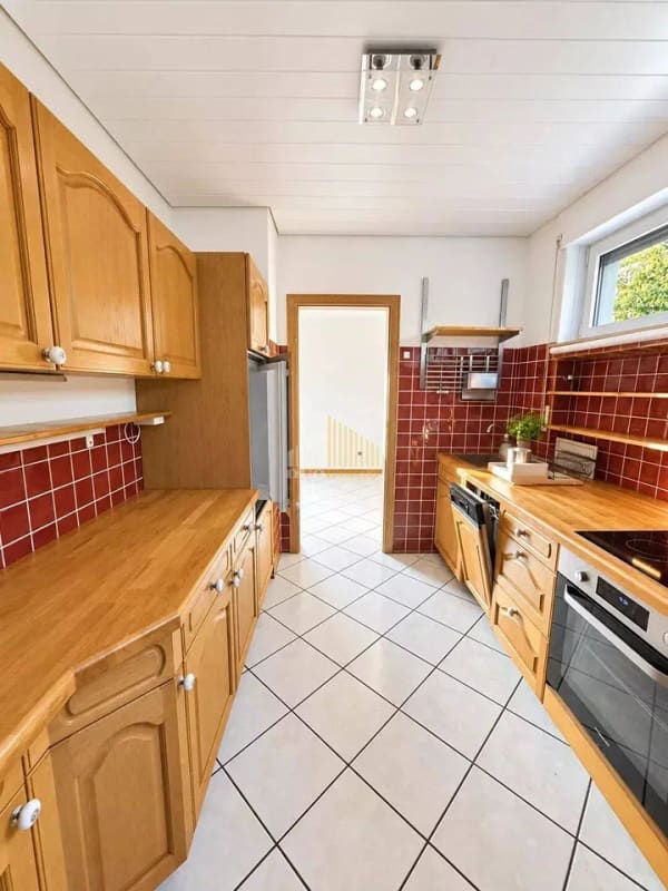 Immobilie in Bollendorf - Charmanter Bungalow in naturnaher Lage mit großem Grundstück, Garage und Stellplätzen - Bild 2
