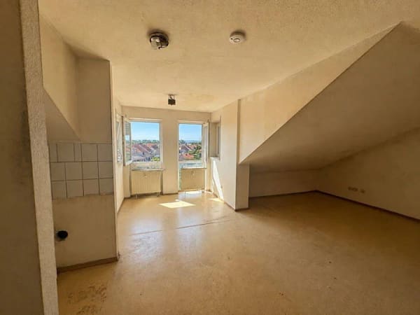 Immobilie in Philippsburg - Leerstehende DG-Wohnung mit vielseitigem Entwicklungspotenzial - Bild 1
