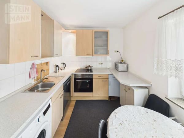Immobilie in Rinteln - Zentral in Rinteln: Großzügige 4-Zimmer-Wohnung mit Balkon und Blick ins Grüne - Bild 3