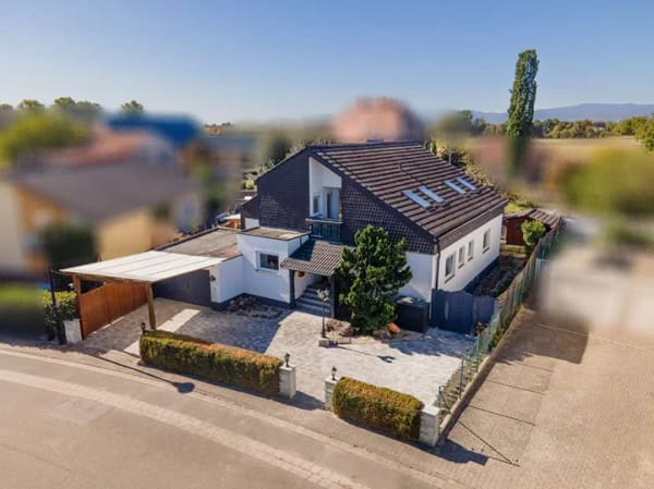 Immobilie in Rödersheim-Gronau - Großzügiges Einfamilienhaus mit beheizbarem Indoor-Pool, Garten und außergewöhnlichem Platzangebot - Bild 1