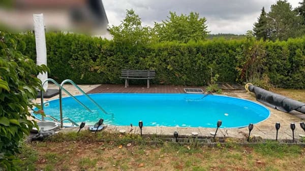 Immobilie in Hungen - Vielseitig wohnen: Gepflegtes Dreifamilienhaus, zusätzliche Einliegerwohnung, Garten und Pool in Hu - Bild 1