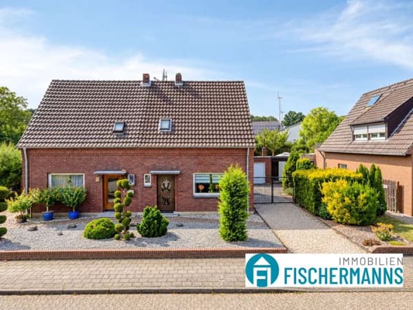 Immobilie in Rheurdt - Doppelhaushälfte mit Doppel Garage und großen Grundstück in Zentraler Lage von Rheurdt - Bild 0