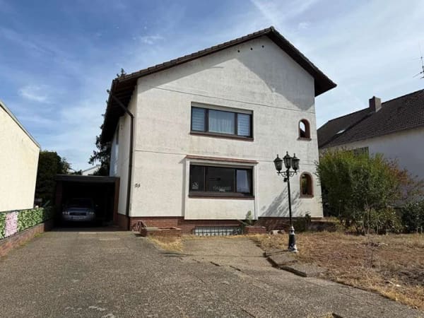 Immobilie in Schwetzingen - Zweifamilienhaus mit Ausbaupotenzial auf großzügigem Grundstück - Bild 3