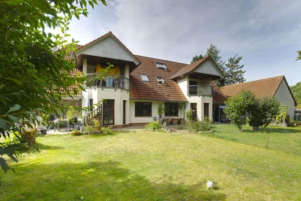 Immobilie in Brünzow - Mehrfamilienhaus mit parkähnlichem Grundstück in Ostseenähe - Bild 1