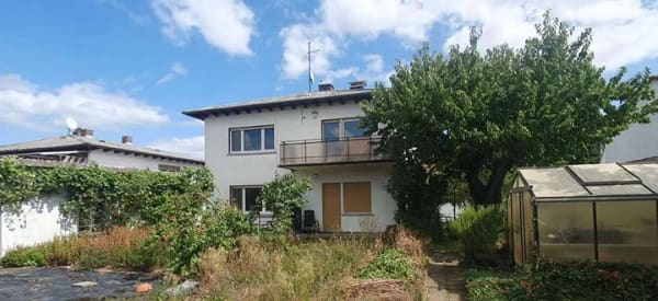 Immobilie in Linden - Attraktives Haus mit zwei Wohnungen und schönem Garten - Bild 2