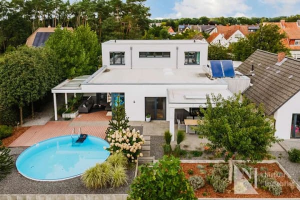 Immobilie in Brietlingen - Hochwertiges Einfamilienhaus mit großem Grundstück, Pool & vielseitigem Raumangebot - Bild 2