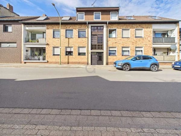 Immobilie in Nörvenich - Solide Dachgeschoßwohnung mit Terrasse in dörflicher Lage - Bild 1