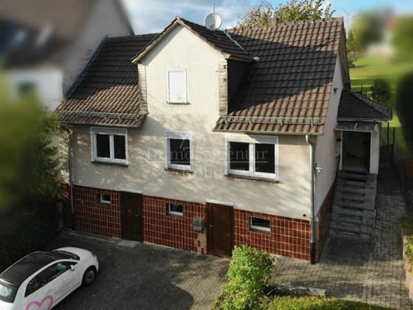 Immobilie in Schauenburg - Einfamilienhaus mit Ausbaupotenzial und großem Grundstück in ruhiger Lage von Schauenburg - Bild 0
