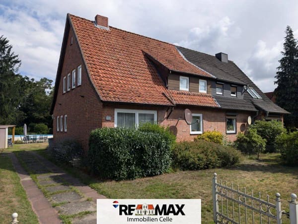 Immobilie in Hambühren - Doppelhaushälfte mit großzügigem Grundstück - Sanierungsbedürftig! (MA-1020-324) - Bild 0