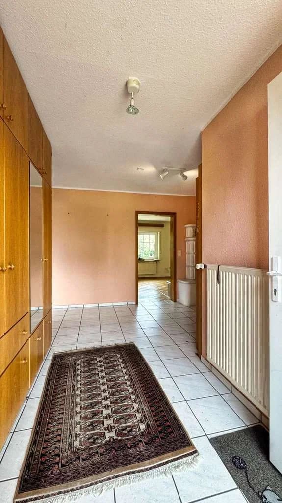 Immobilie in Saterland - RESERVIERT ----- Bezugsbereiter Bungalow mit naturnahem Garten in Strücklingen - Bild 4