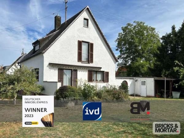 Immobilie in Gablingen - Freistehendes Einfamilienhaus mit großem Südgarten und Gestaltungspotenzial - Bild 0