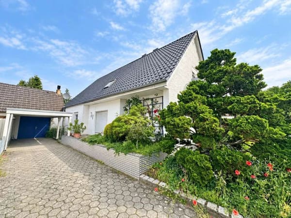 Immobilie in Emsdetten - Zweifamilienhaus mit viel Platz und eingewachsenem Garten - Bild 2