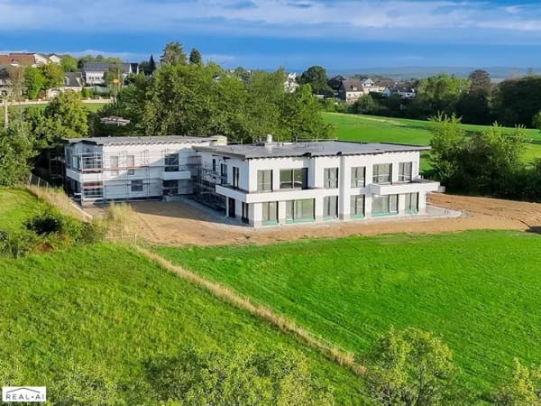 Immobilie in Horhausen (Westerwald) - Modern, energieeffizient und komfortabel – Hochwertige Erdgeschosswohnung mit Terrasse in Horhausen! - Bild 0