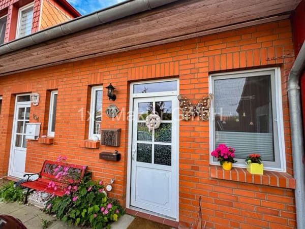 Immobilie in Klein Rogahn - Provisionsfreies Reihenhaus mit Südterrasse, Garten und 2 Stellplätzen - Bild 1
