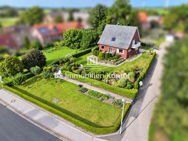Immobilie in Hinte - Top gepflegtes Einfamilienhaus mit Garage und gr. Gartenanlage! - Bild 0