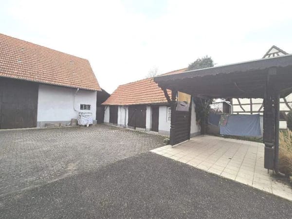 Immobilie in Jockgrim - Ein ansprechendes Anwesen mit Scheune, Garten, und div. Nebengebäuden     - Bild 1