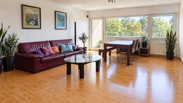 Immobilie in Ismaning - Schicke 3-Zi.-Wohnung m. Balkon u. TG-Platz in Ismaning - Bild 1