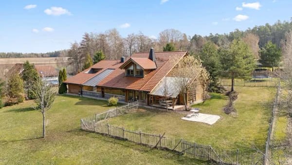 Immobilie in Schnabelwaid - Einzigartiges Grundstück! Großzügiges Einfamilienhaus in Blockbohlenbauweise mit ELW - Bild 1