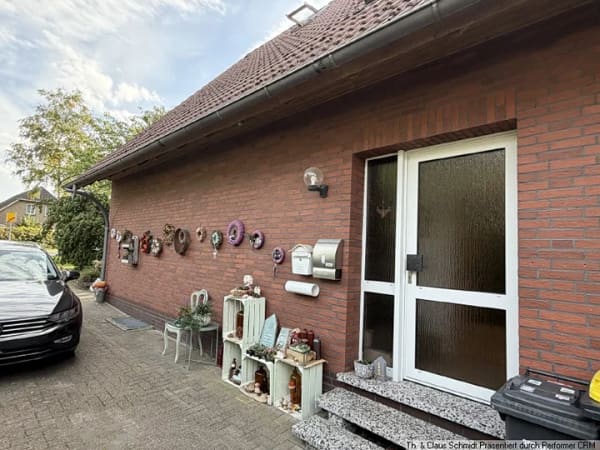 Immobilie in Dötlingen - Vielseitiges Einfamilienhaus, als Zweifamilienhaus nutzbar, mit Vollkeller & Garage in Neerstedt - Bild 1