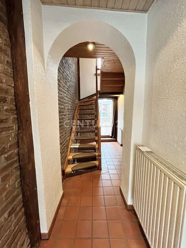 Immobilie in Baesweiler - Familienfreundliches Reihenmittelhaus mit Wintergarten und Garten in Baesweiler - Bild 1