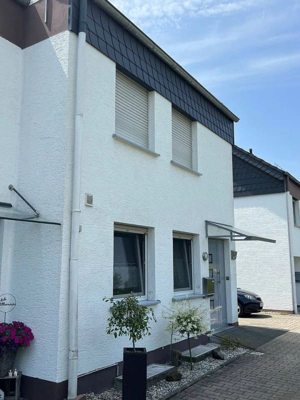 Immobilie in Beckum - Reihenendhaus mit viel Platz, Wintergarten und Garage - ideal für große Familien! - Bild 0