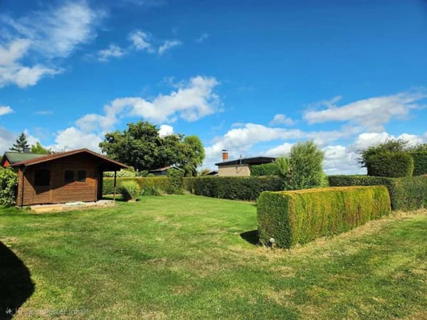 Immobilie in Saal - Modernisiertes Ferienhaus  am Feld mit Kaminfeuer und Ostseenähe - Bild 1