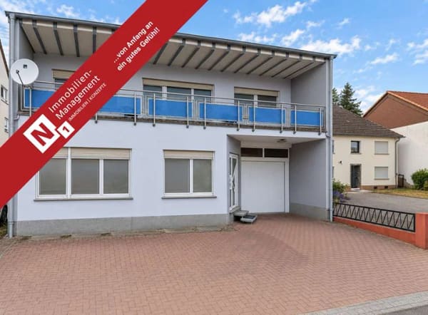 Immobilie in Hütschenhausen - Wohn- und Geschäftshaus oder Zweifamilienhaus mit Garten und Carport - Bild 0