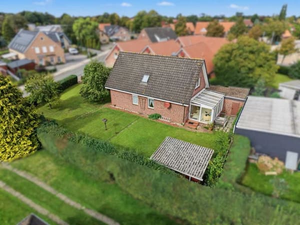Immobilie in Detern - Gemütliches Zuhause in zentraler Lage von Detern mit Wintergarten und Garage - Bild 2