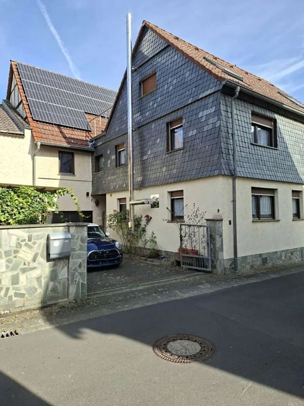 Immobilie in Florstadt - Einfamilienhaus mit Freisitz, Garage und ausbaubarem Nebengebäude - OT Staden - Bild 1