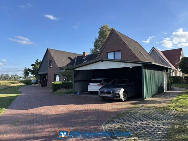 Immobilie in Westerstede - Vielseitiges Dreifamilienhaus mit traumhaftem Grundstück - Bild 1