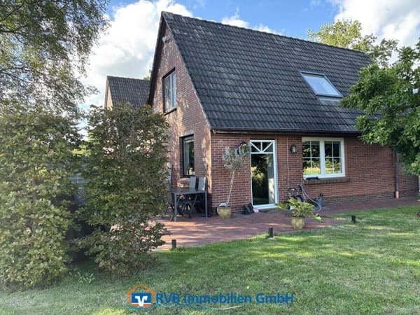 Immobilie in Westerstede - Vielseitiges Dreifamilienhaus mit traumhaftem Grundstück - Bild 4