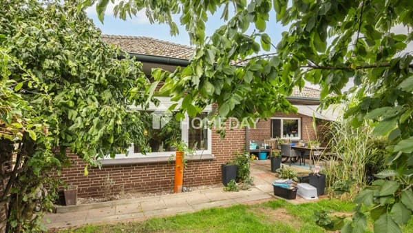 Immobilie in Visbek - Barrierefreier Bungalow mit Kamin, Garage, Garten und Ausbaureserve in Visbek - Bild 1