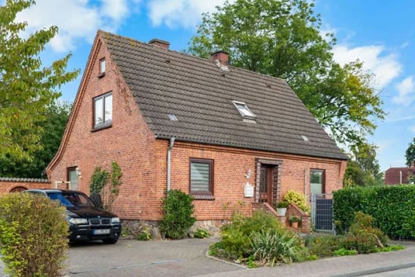 Immobilie in Rabel - Charmanter Rotklinker-Traum nahe der Schlei – Einfamilienhaus mit idyllischem Garten & Kaminofen - Bild 0