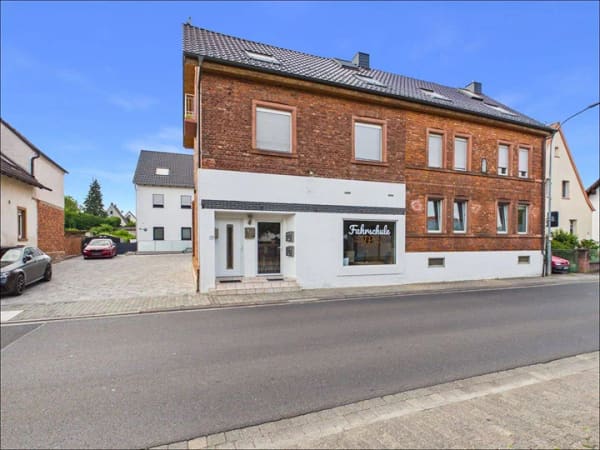 Immobilie in Sulzbach am Main - Gepflegtes vollvermietetes Mehrfamilienhaus mit Gewerbeeinheit in Sulzbach - Bild 0
