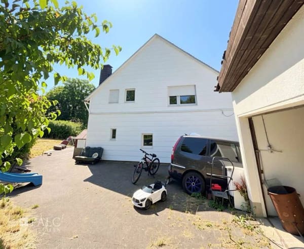 Immobilie in Windeck - Viel Grundstück. Viel Potenzial. Viele Möglichkeiten. – Sanierungsobjekt mit Baulandperspektive - Bild 1