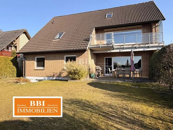 Immobilie in Henstedt-Ulzburg - Einfamilienhaus mit Einliegerwohnung auf sonnigem Grundstück - Bild 0