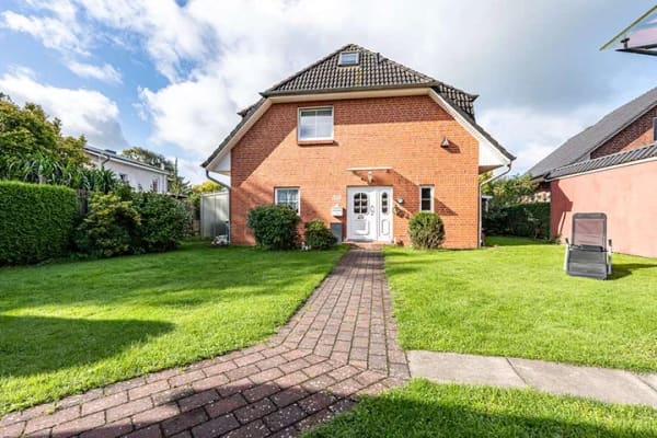Immobilie in Ellerhoop - Gepflegte Doppelhaushälfte mit viel Platz, Carport, ﻿Garten und Vollkeller - Bild 1