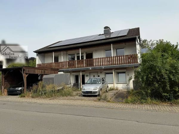 Immobilie in Neuenrade - Einfamilienhaus mit Apartment im Souterrain in bester Wohnlage von Neuenrade - Bild 0