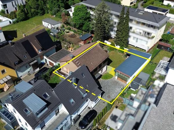 Immobilie in Germering - Geräumiges  Reiheneckhaus auf ruhigem Grundstück mit großem Entwicklungspotenzial - Bild 1
