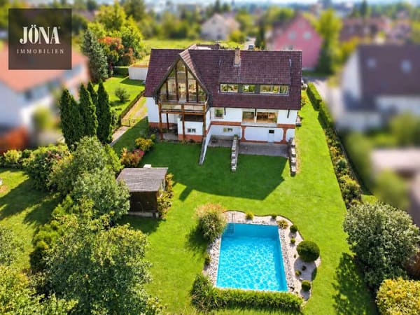Immobilie in Stadtsteinach - Einziehen - wohlfühlen!
Großzügiges Zweifamilienhaus mit Pool und großem Garten - Bild 2