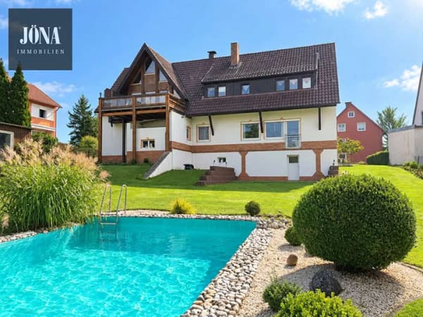 Immobilie in Stadtsteinach - Einziehen - wohlfühlen!
Großzügiges Zweifamilienhaus mit Pool und großem Garten - Bild 4