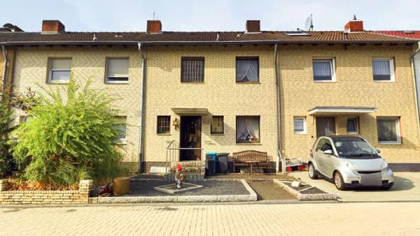 Immobilie in Jüchen - Familienfreundliches Reihenmittelhaus in Spielstraße-Sackgassenlage mit Garten und viel Potenzial - Bild 1