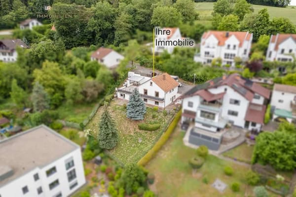 Immobilie in Birkenau - Wohnen mit Weitblick – Einfamilienhaus mit Einliegerwohnung in attraktiver Hanglage - Bild 0